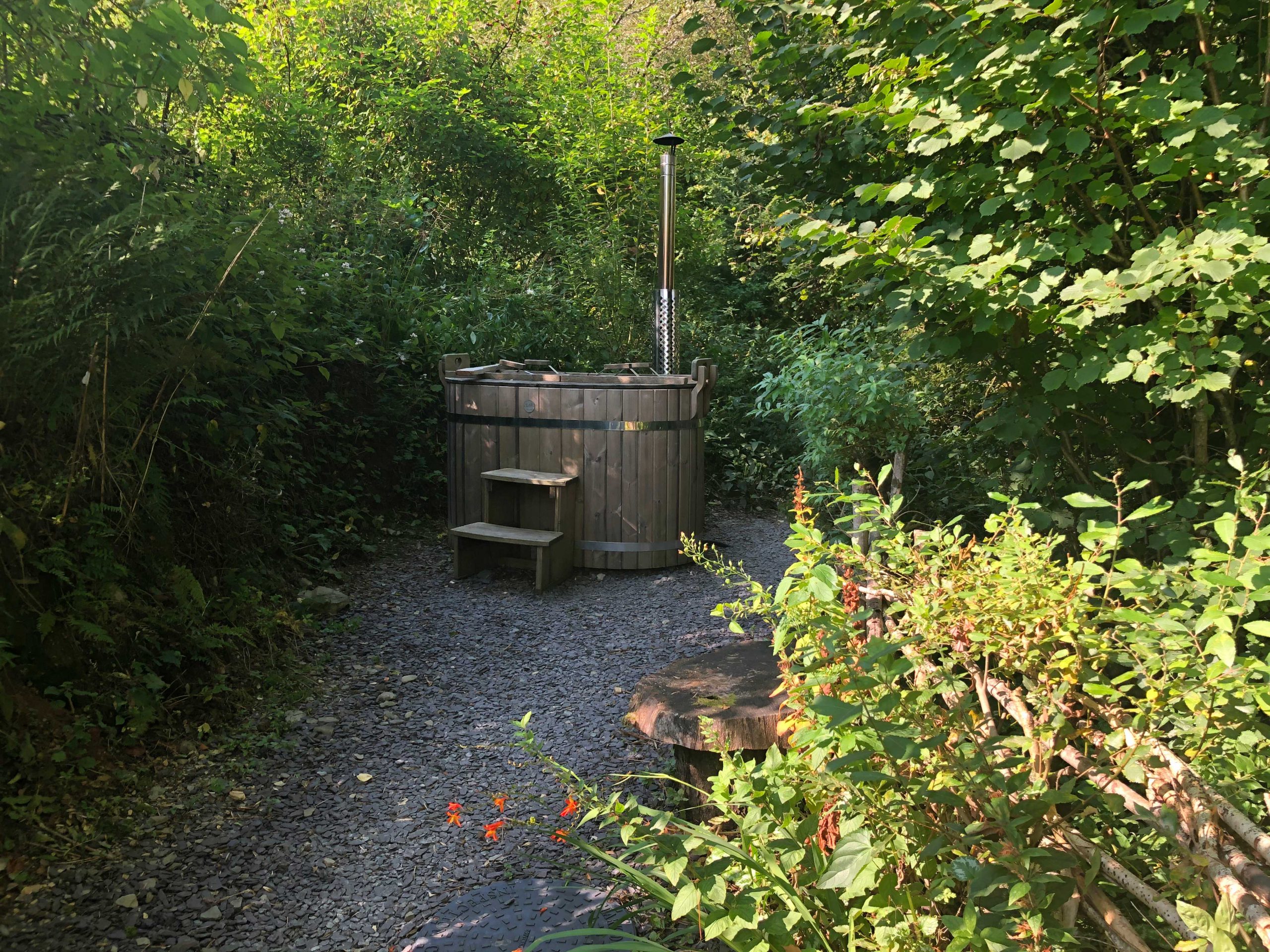 wood fired hot tub in secluded woods